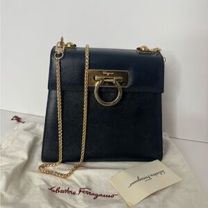 Salvatore Ferragamo Crossbody Bag with Gold Hardware.